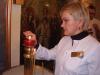 Наталья Ивановна Горисюк возжигает лампаду